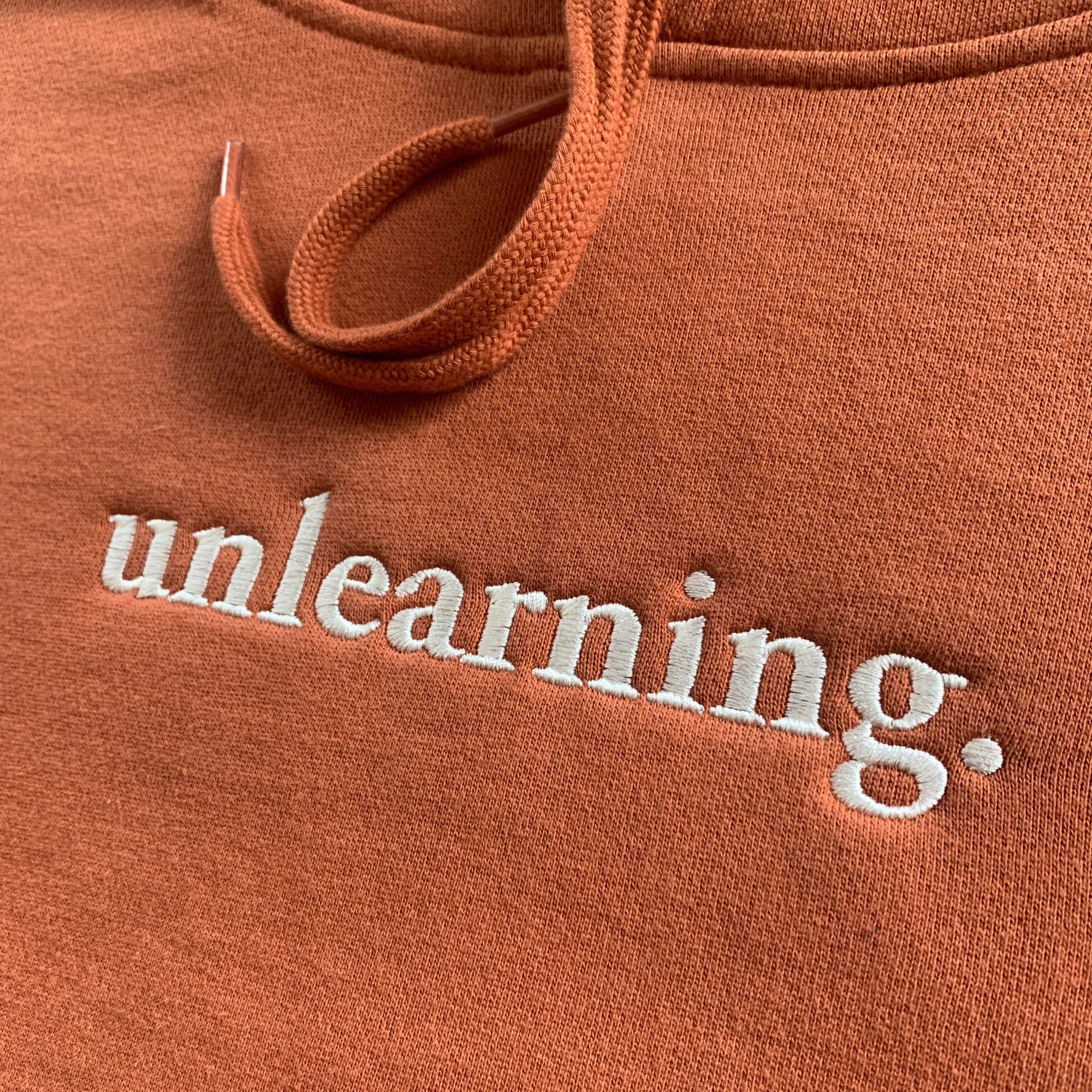 Unlearning Graphic Pullover Hoodie - Cozy Casualwear for Everyday Style